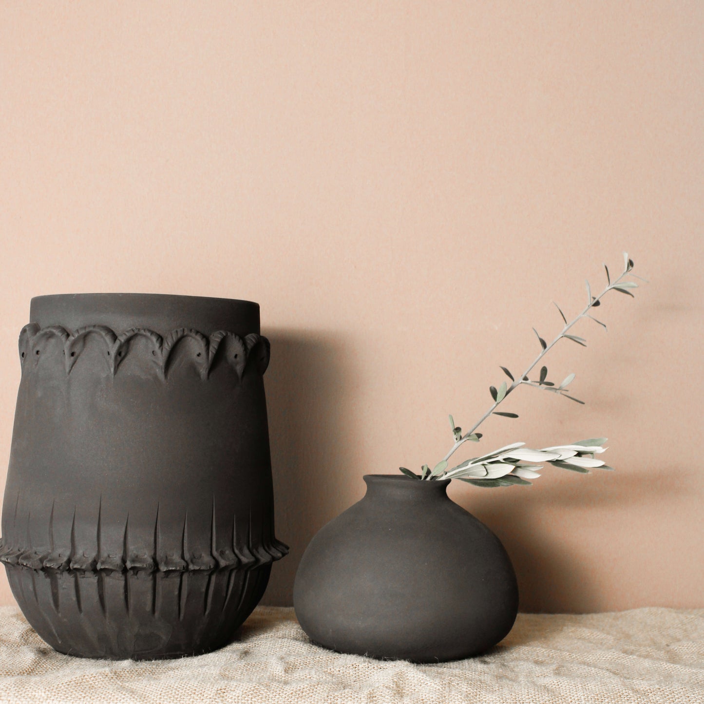 Handmade ceramic black vase with ram heads - Wild n Clay Ceramics