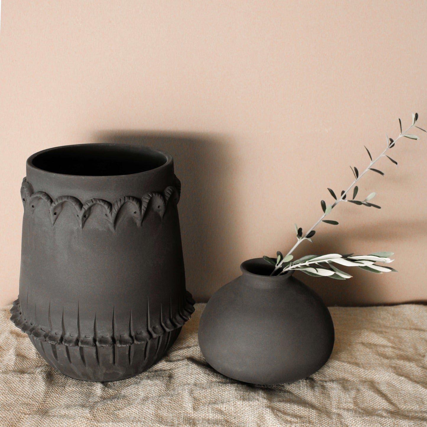 Handmade ceramic black vase with ram heads - Wild n Clay Ceramics